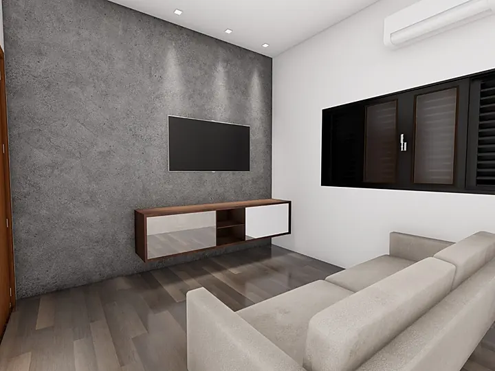 Sala de estar com parede de cimento queimado, painel de TV e sofá cinza