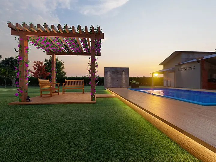 Pérgola com flores ao lado de piscina com deck de madeira ao pôr do sol
